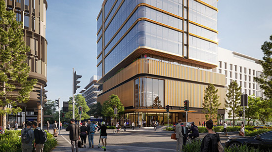 An artist’s impression of the exterior of 50 First Avenue seen from across an intersection. The glass-walled ground floor lobby sits below several wood-panelled floors leading to multiple floors of gleaming glass-walled offices reflecting the sun.