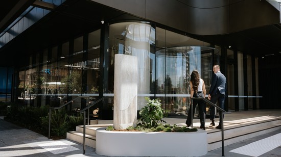 Tenants entering off the street through the entrance at 50 First Avenue.