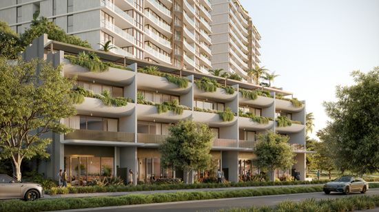 An artist’s impression of the lower levels of SOL by Walker, with various retail stores along the street level and modern apartments with lush greenery on their balconies extending above.